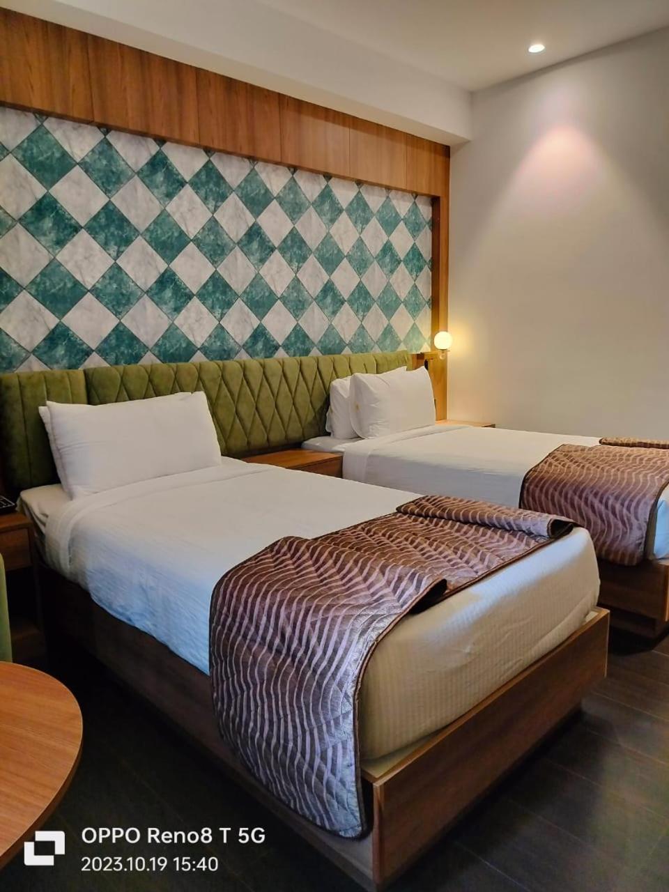 Hotel Mandarin Sky Kannur Esterno foto