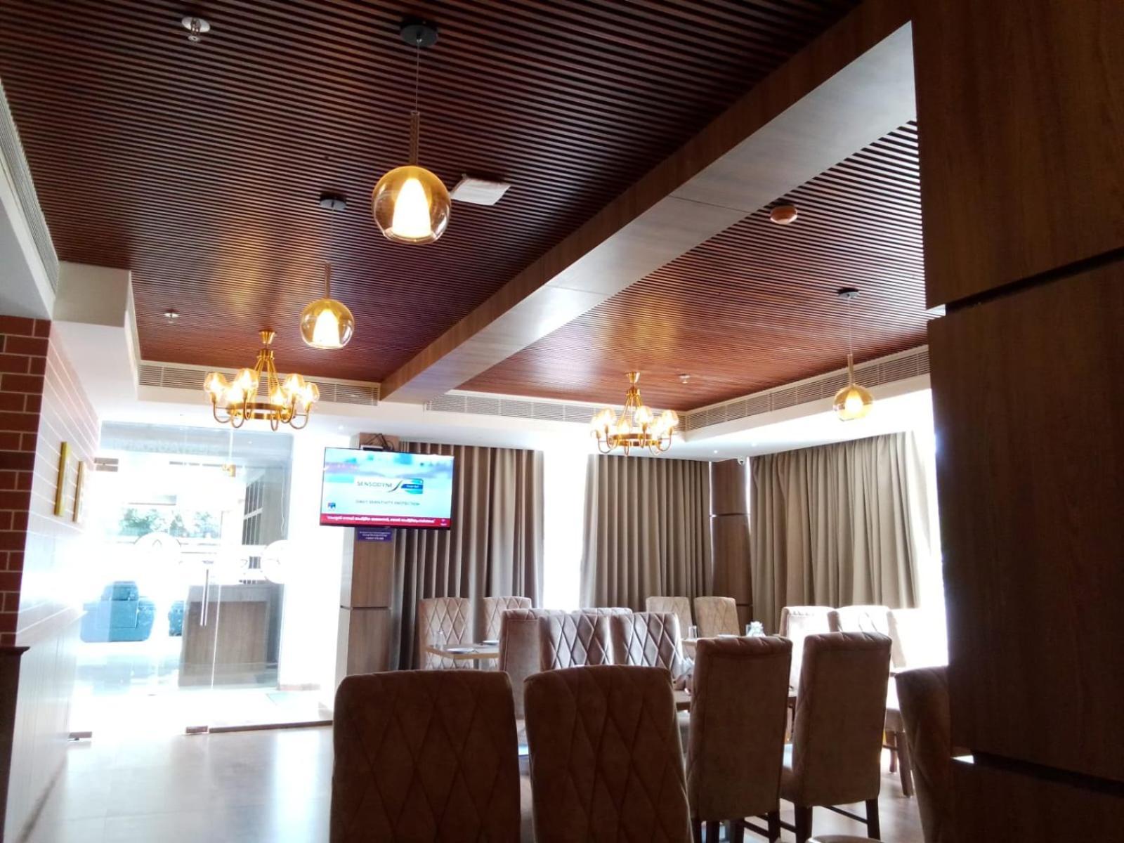 Hotel Mandarin Sky Kannur Esterno foto