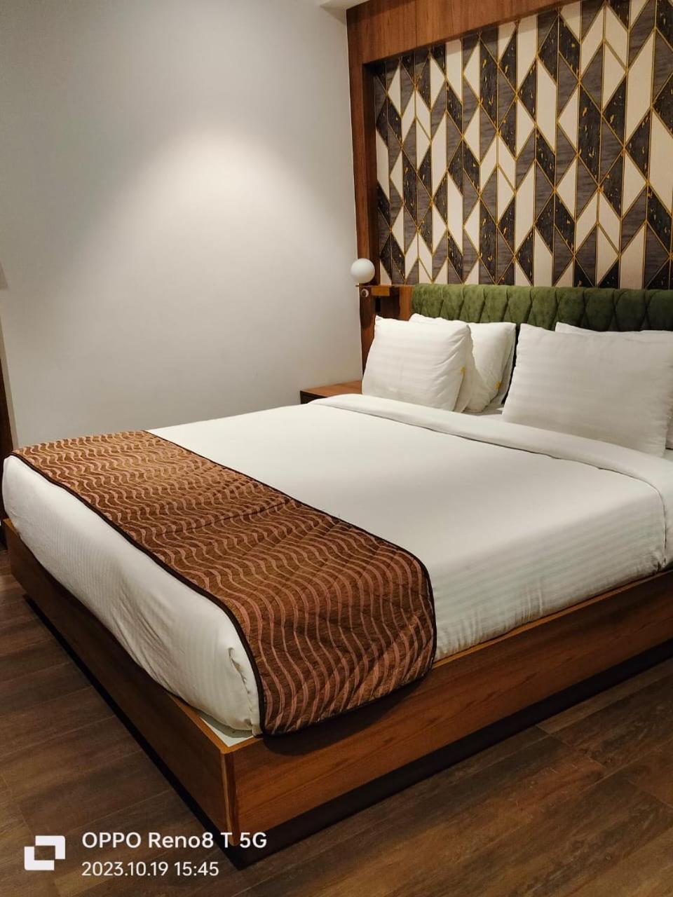 Hotel Mandarin Sky Kannur Esterno foto